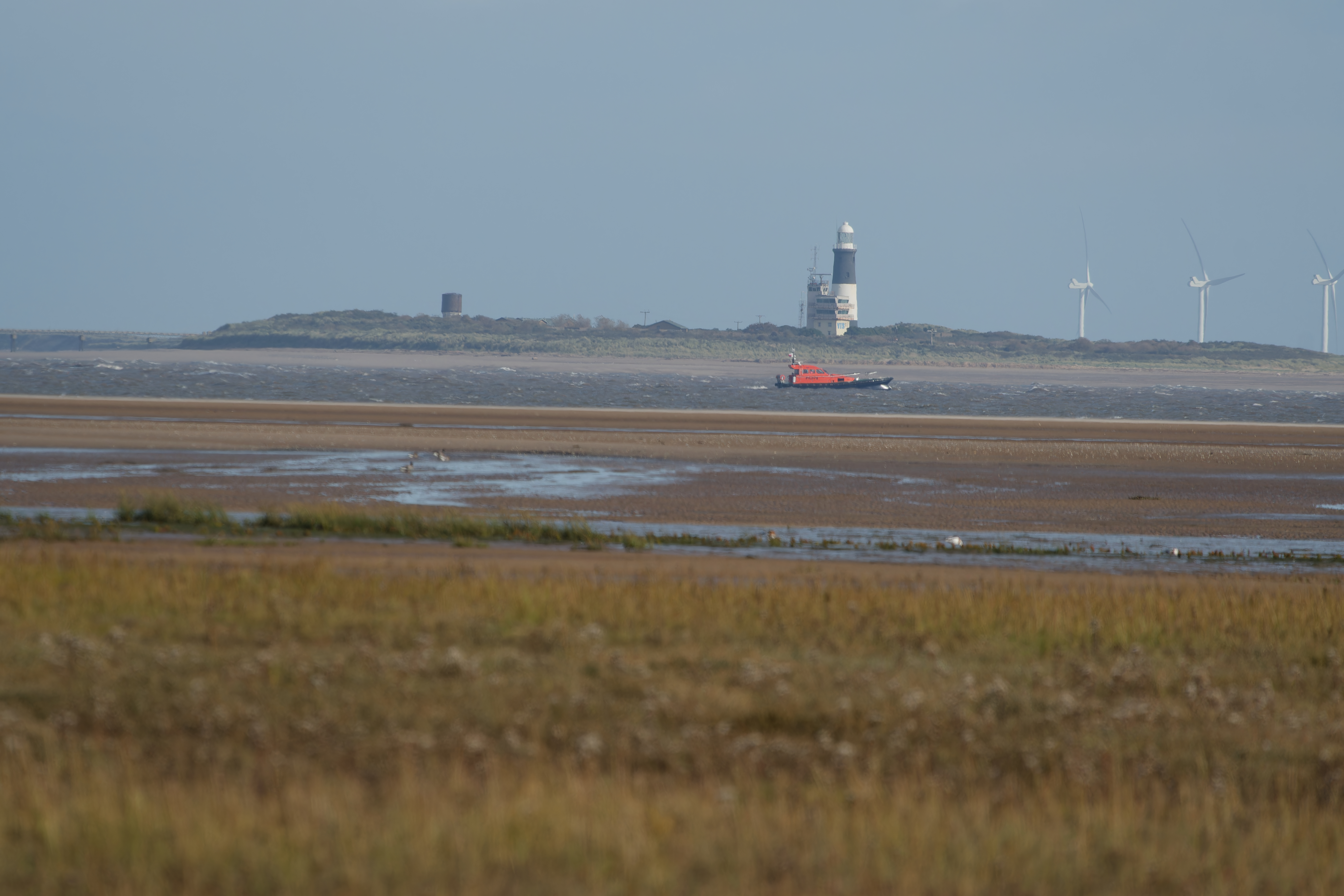 View of Spurn point across the estuary and mudflats from Cleethorpes