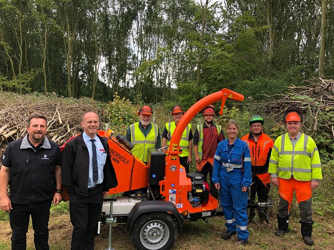 HCV taking delivery of a new Timberwolf TW160ph chipper.  Left to right are Timberwolf Dealer Manager Pete Warner, Guy Ward of Chandlers Farm Equipment, Chris Harper, Martin Bell and Jason Bell of Humber Conservation Volunteers, Rebecca Brimble, Communication Co-Ordinator at Total Lindsey Oil Refinery, Dave Parkin, Chair Humber Conservation Volunteers and Alan Jones of Humber Nature Partnership.