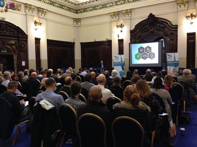 Group of attendees, watching a talk at the Humber Nature Partnership conference.