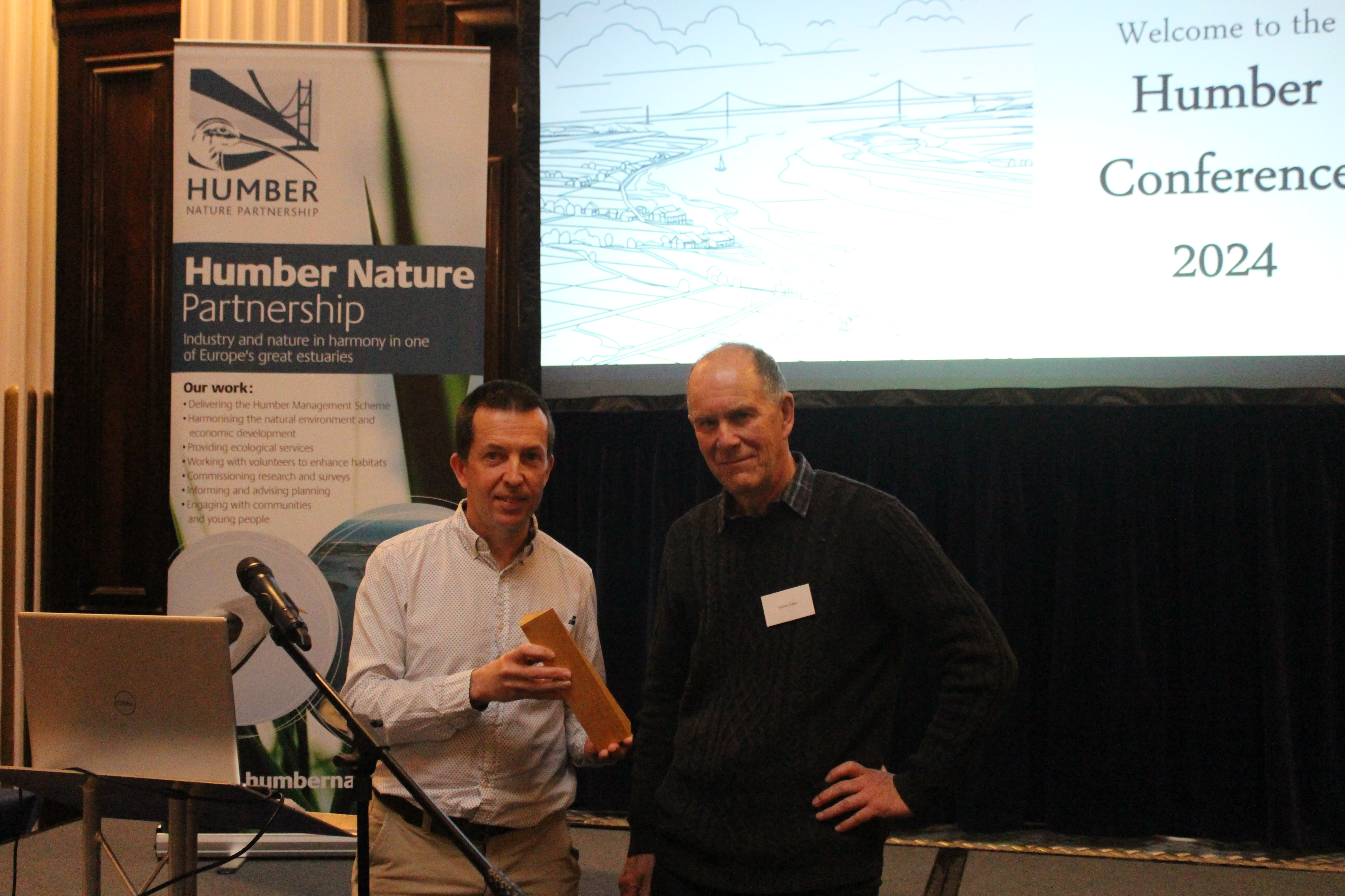 Andrew Taylor presenting the HNP award to Graham Catley.